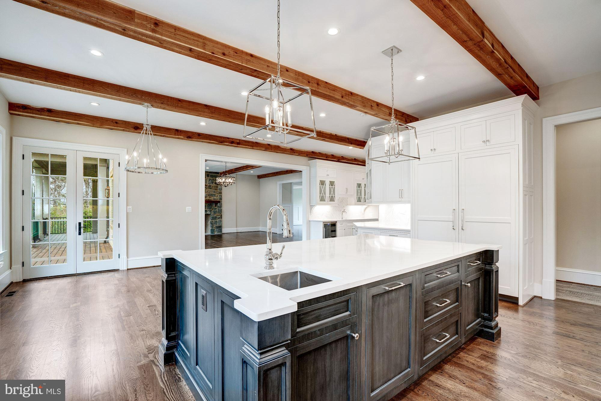 1106 Towlston Road McLean, VA 22102 - Photo 15 of 74 Island features beverage sink & 2 chandeliers