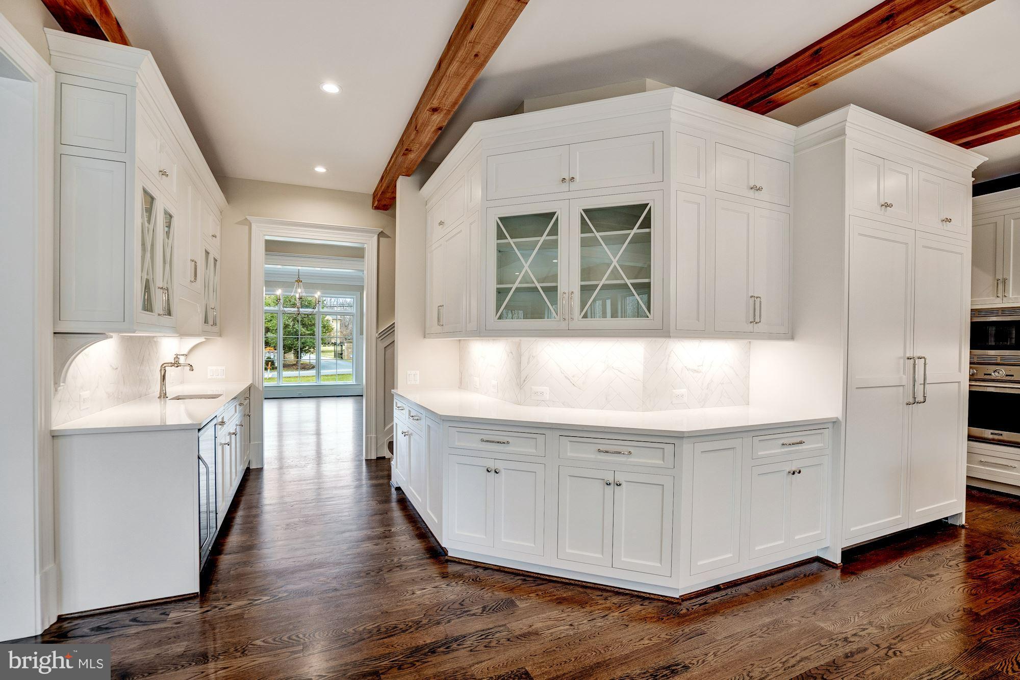 1106 Towlston Road McLean, VA 22102 - Photo 19 of 74 Wrap-around cabinetry with display storage