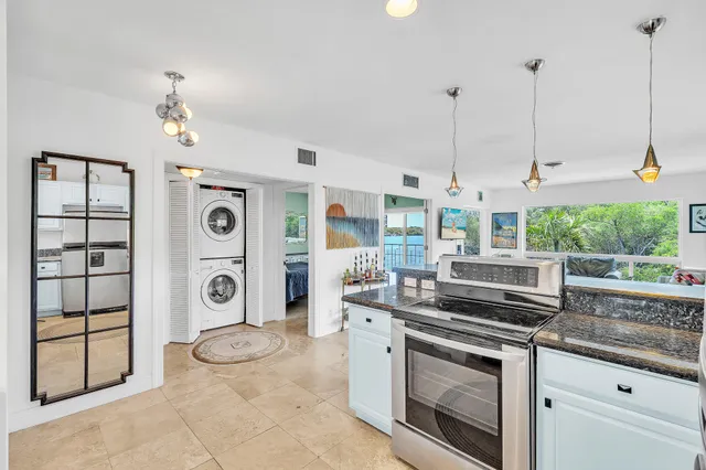 a kitchen with a stove and a sink