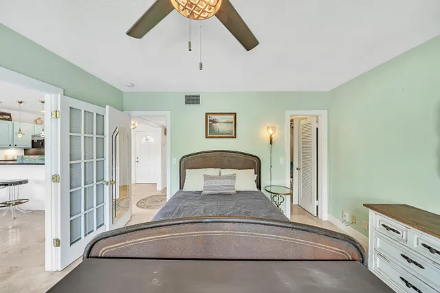 a view of a hallway view with staircase