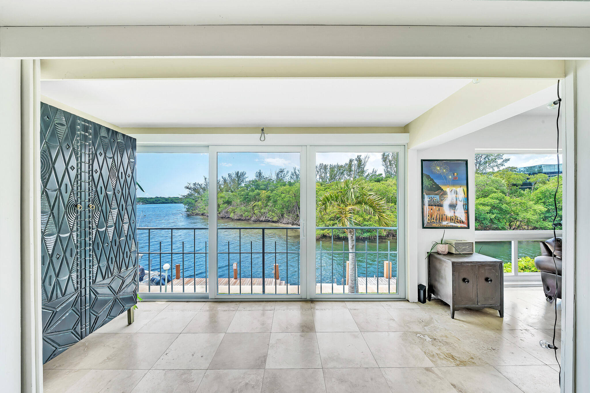 711 Northeast Harbour Terrace, Unit 4120 Boca Raton, FL 33431 - Photo 20 of 37 a view of a room with furniture and a large window