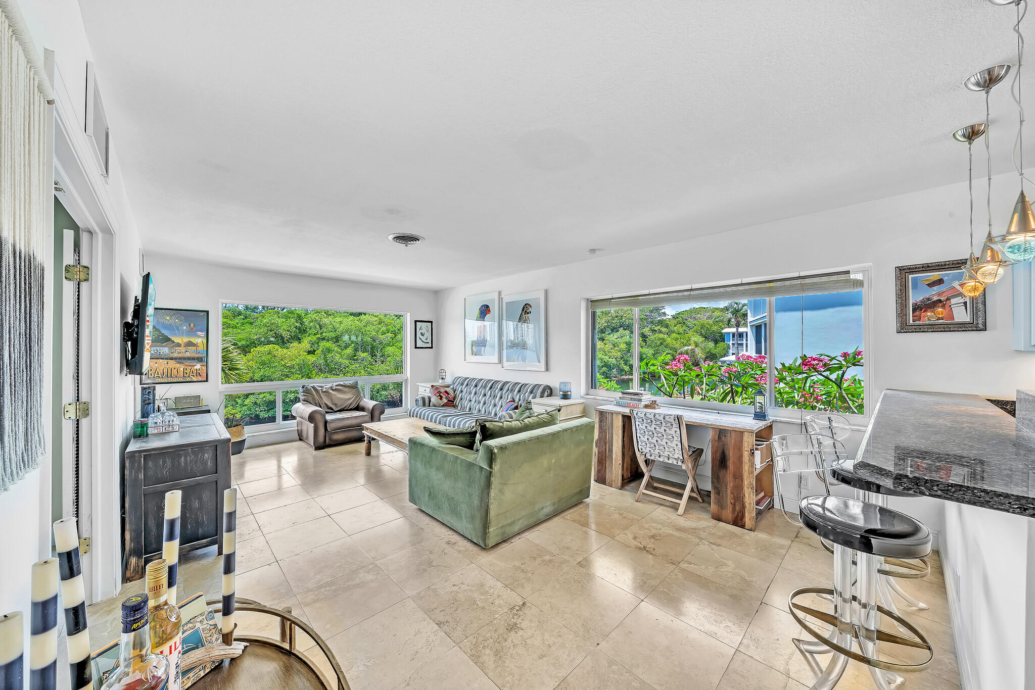 711 Northeast Harbour Terrace, Unit 4120 Boca Raton, FL 33431 - Photo 29 of 37 a living room with furniture and a large window