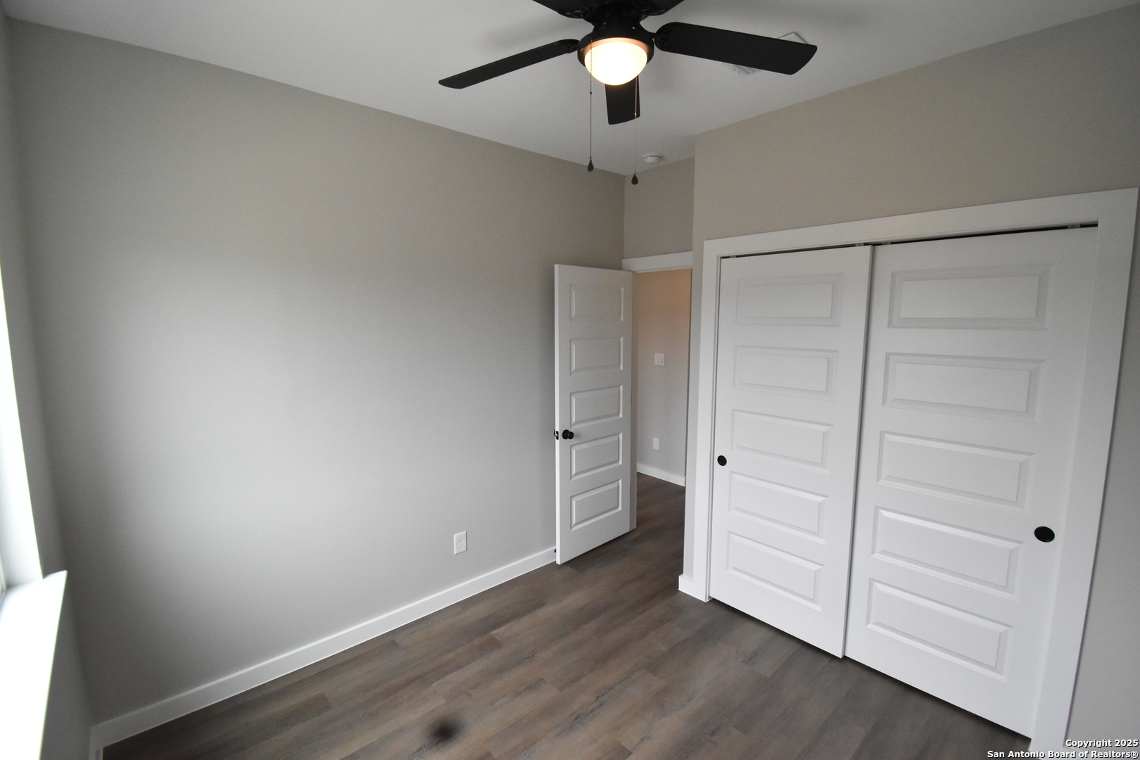 6402 Tahoka Road San Antonio, TX 78227 - Photo 16 of 21 an empty room with wooden floor