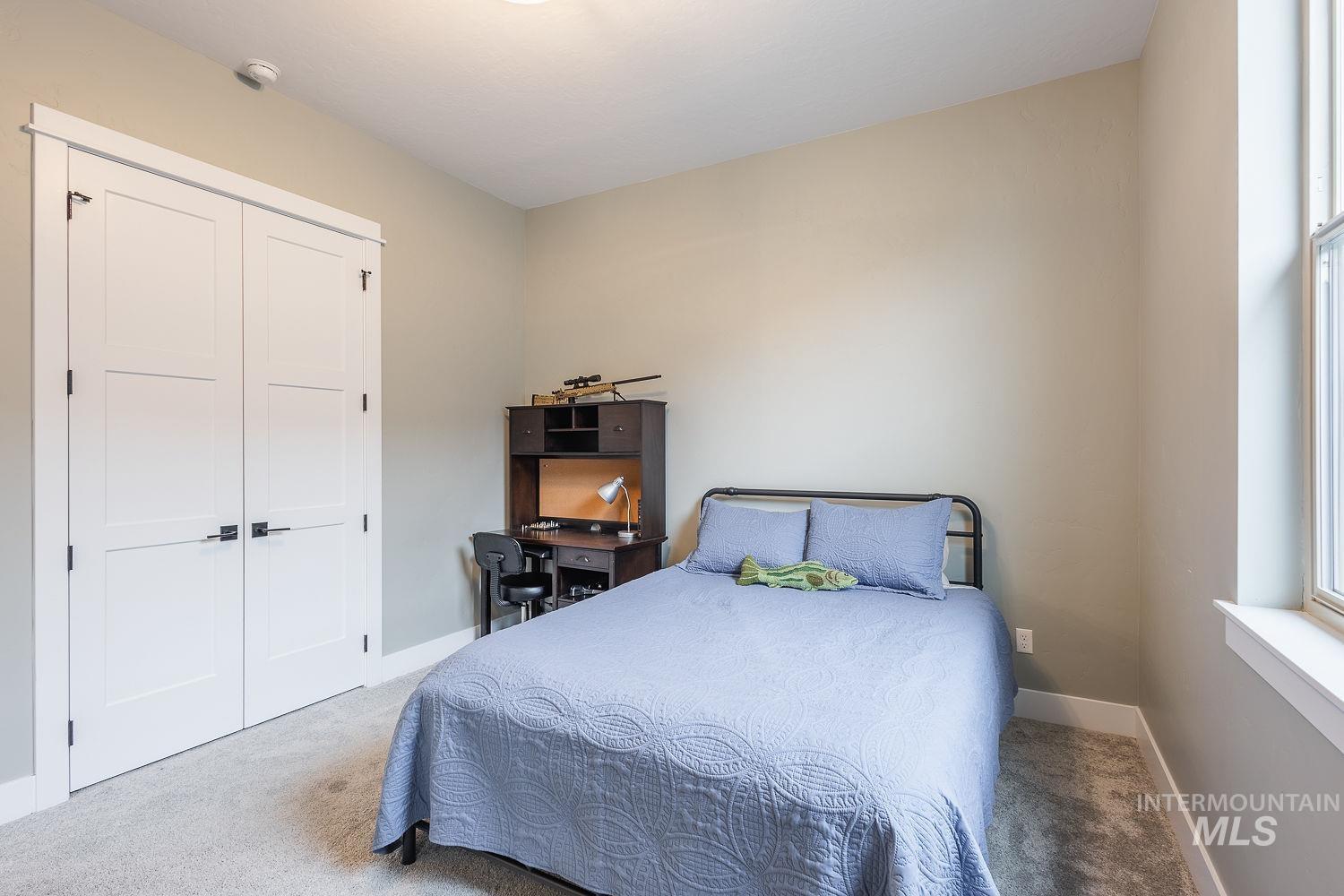 4078 West Wapoot Street Meridian, ID 83646 - Photo 33 of 46 Carpeted bedroom featuring baseboards and a closet