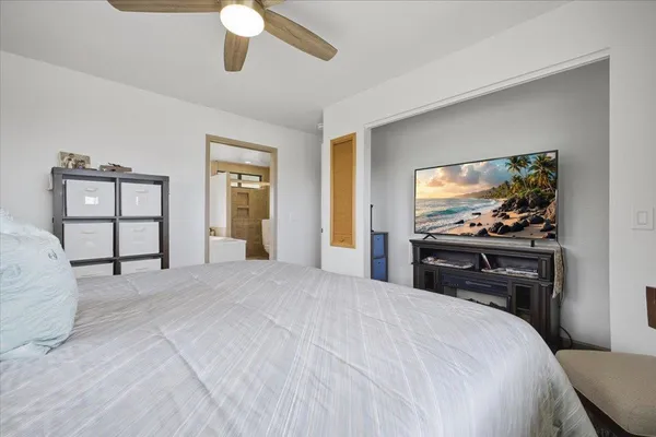 a bathroom with a tub and a mirror