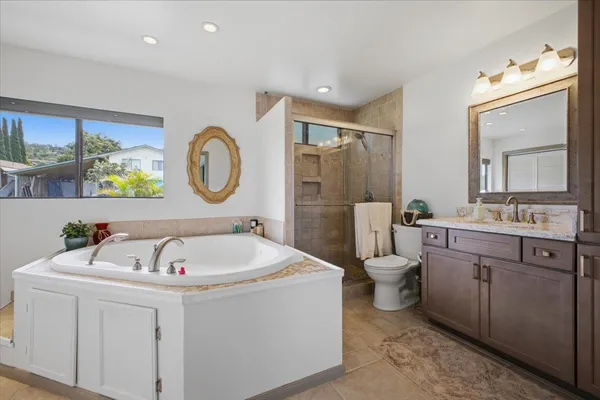 a bathroom with a bathtub and a sink