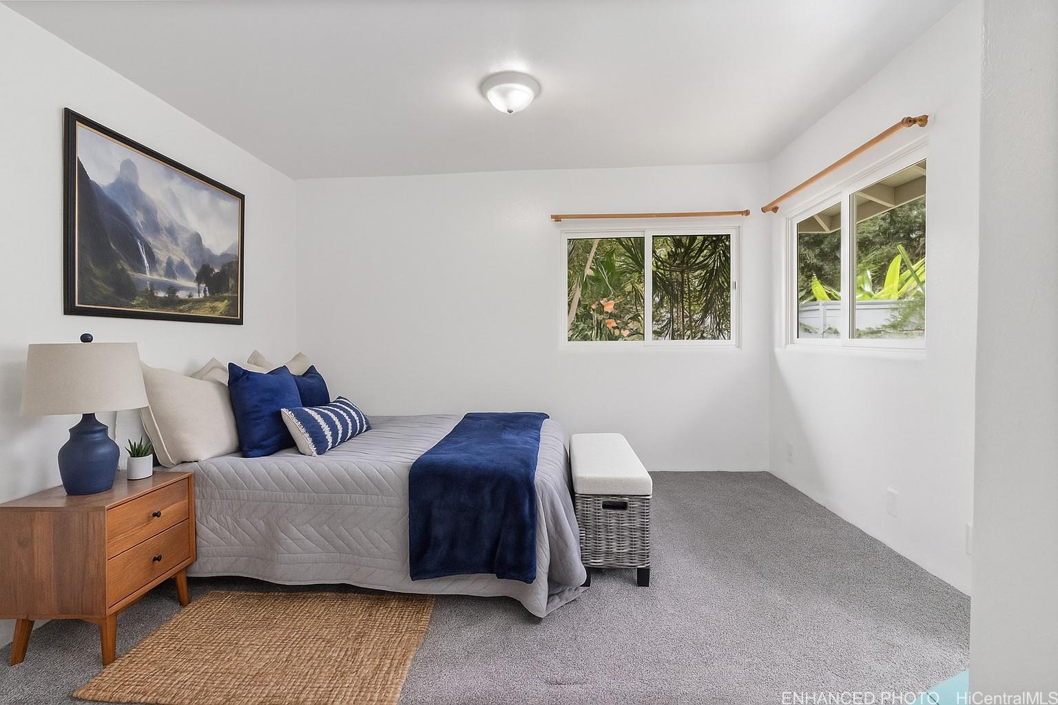 54-230 Hauula Homestead Road, Unit A Hauula, HI 96717 - Photo 12 of 22 a living room with furniture and a window