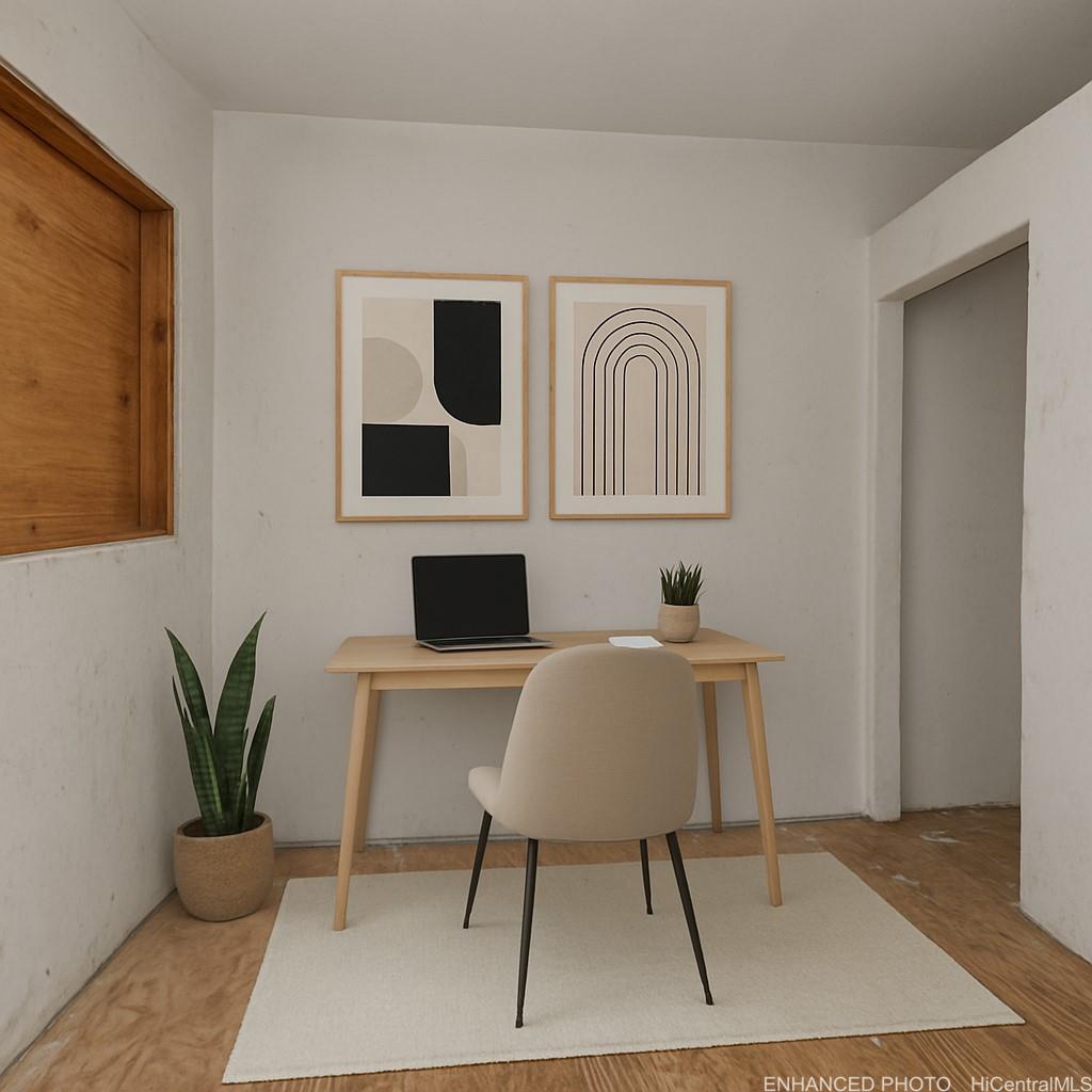 54-230 Hauula Homestead Road, Unit A Hauula, HI 96717 - Photo 16 of 22 a workspace with furniture and a potted plant