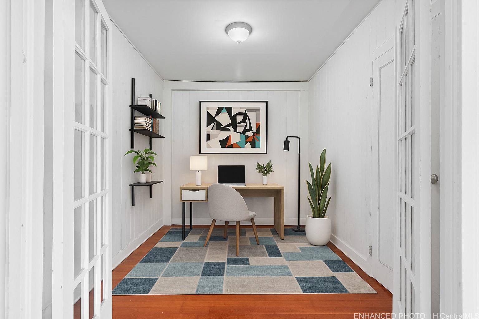 54-230 Hauula Homestead Road, Unit A Hauula, HI 96717 - Photo 17 of 22 a living room with furniture and a rug