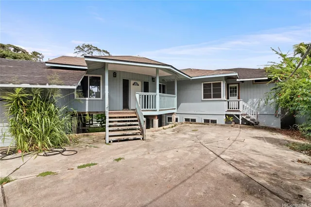 a front view of house with street