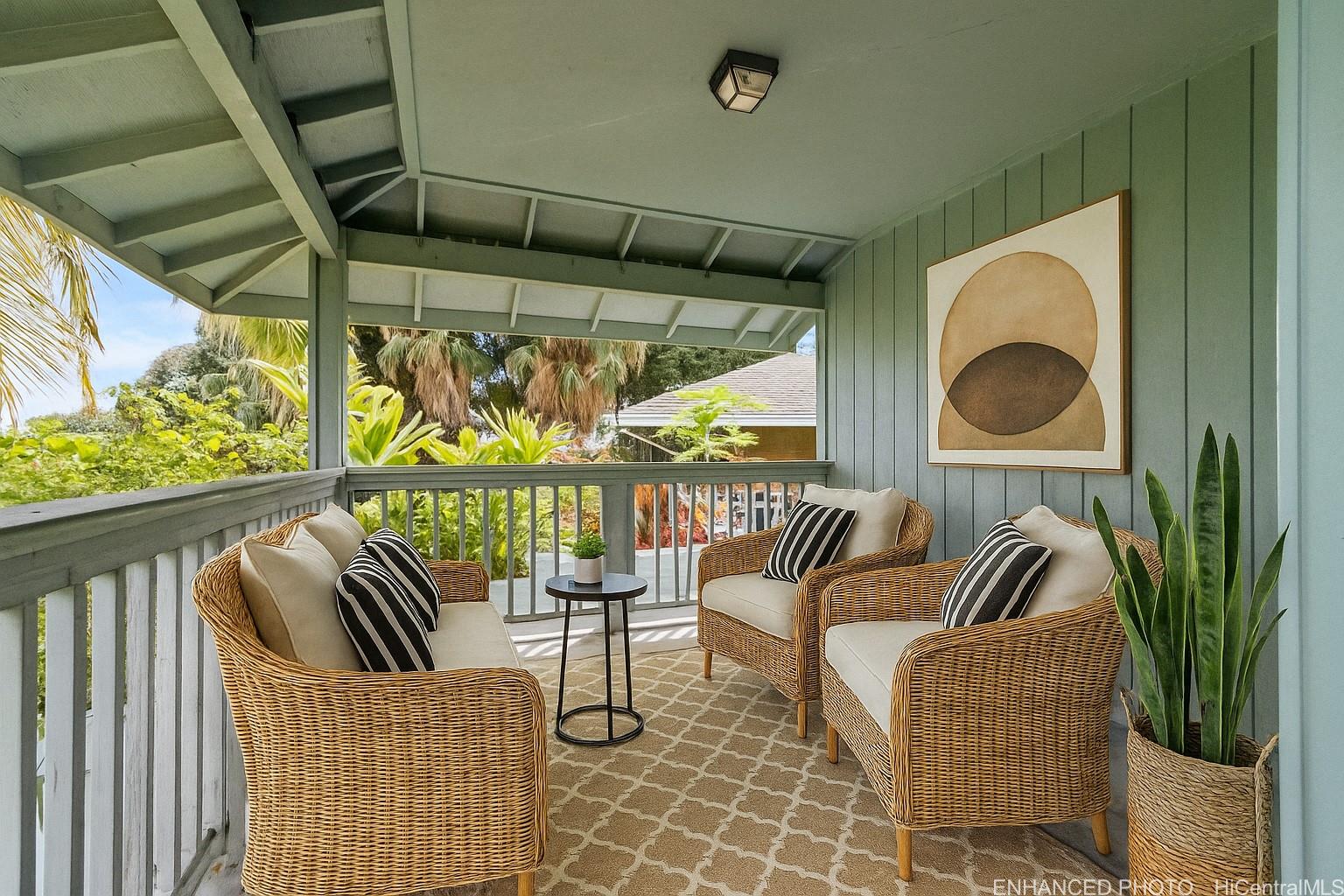 54-230 Hauula Homestead Road, Unit A Hauula, HI 96717 - Photo 5 of 22 a balcony with furniture and a window