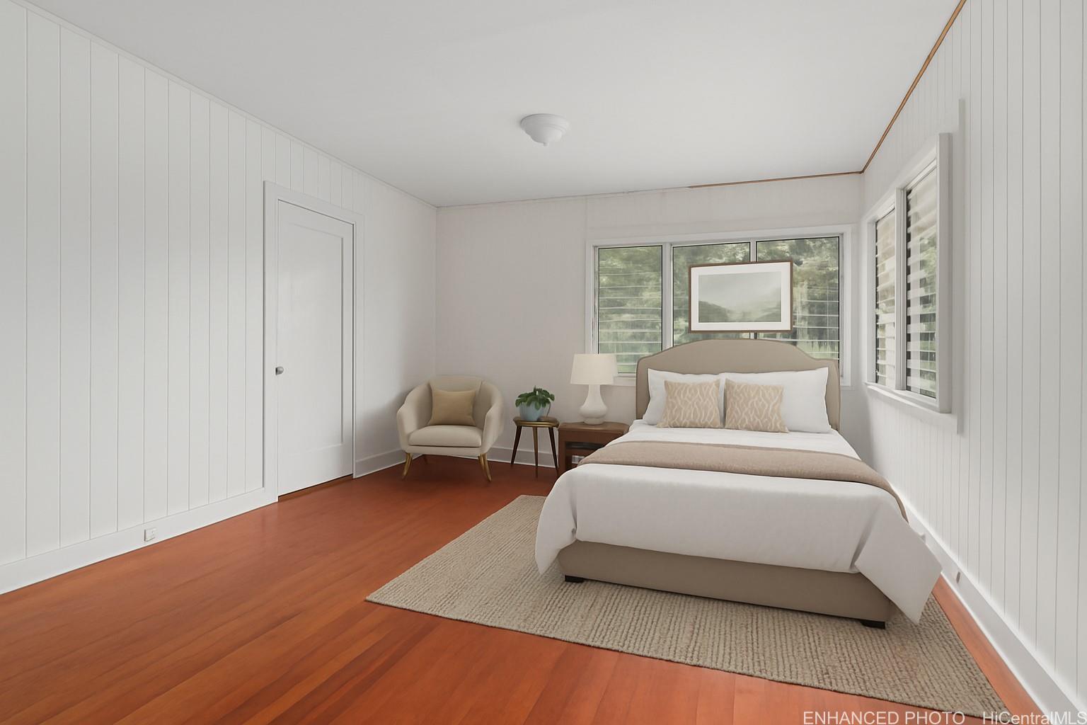 54-230 Hauula Homestead Road, Unit A Hauula, HI 96717 - Photo 10 of 22 a bedroom with a bed and a couch