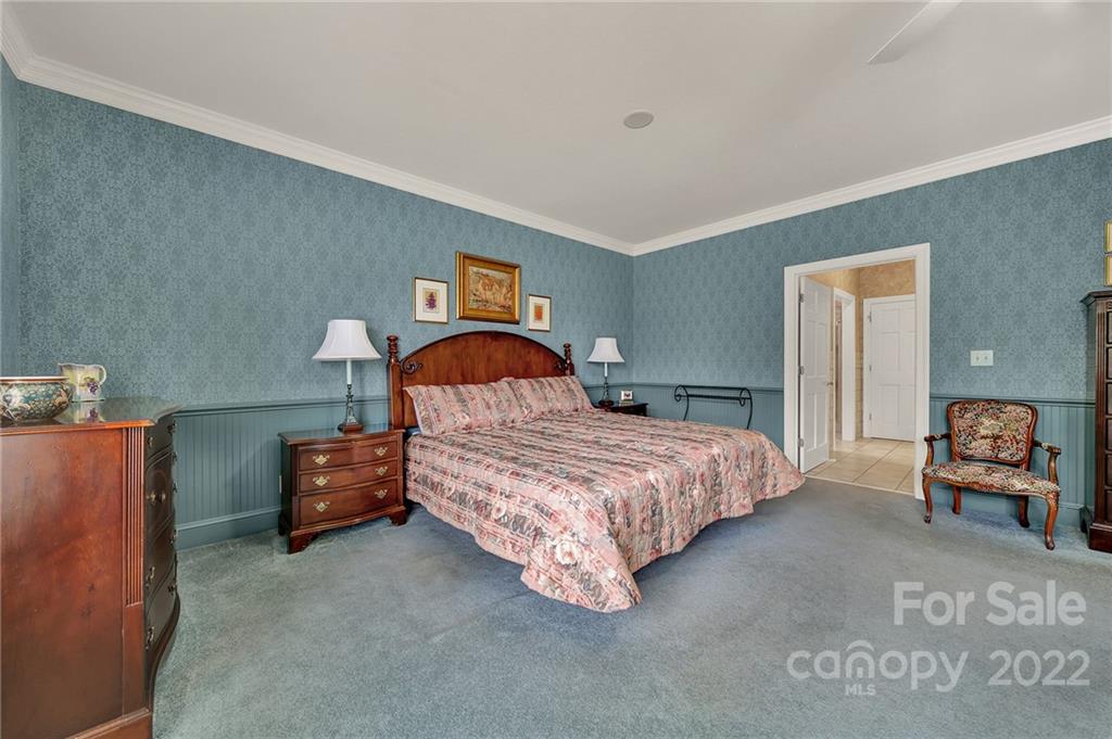 2319 Hough Road Lancaster, SC 29720 - Photo 16 of 48 a bedroom with a bed and a couch