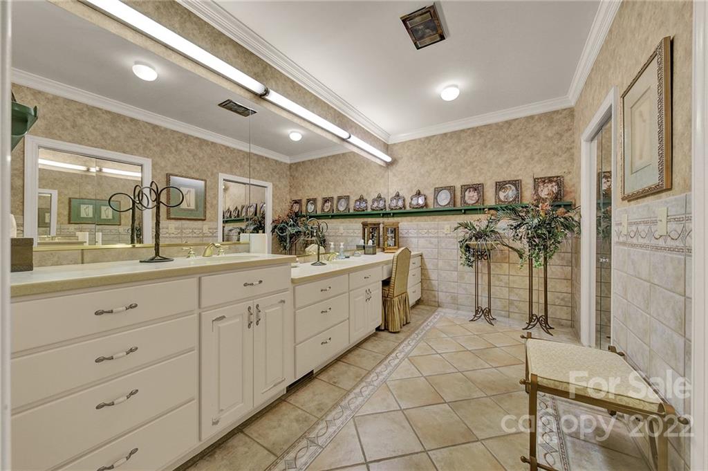 2319 Hough Road Lancaster, SC 29720 - Photo 20 of 48 a spacious bathroom with a shower a sink and a mirror