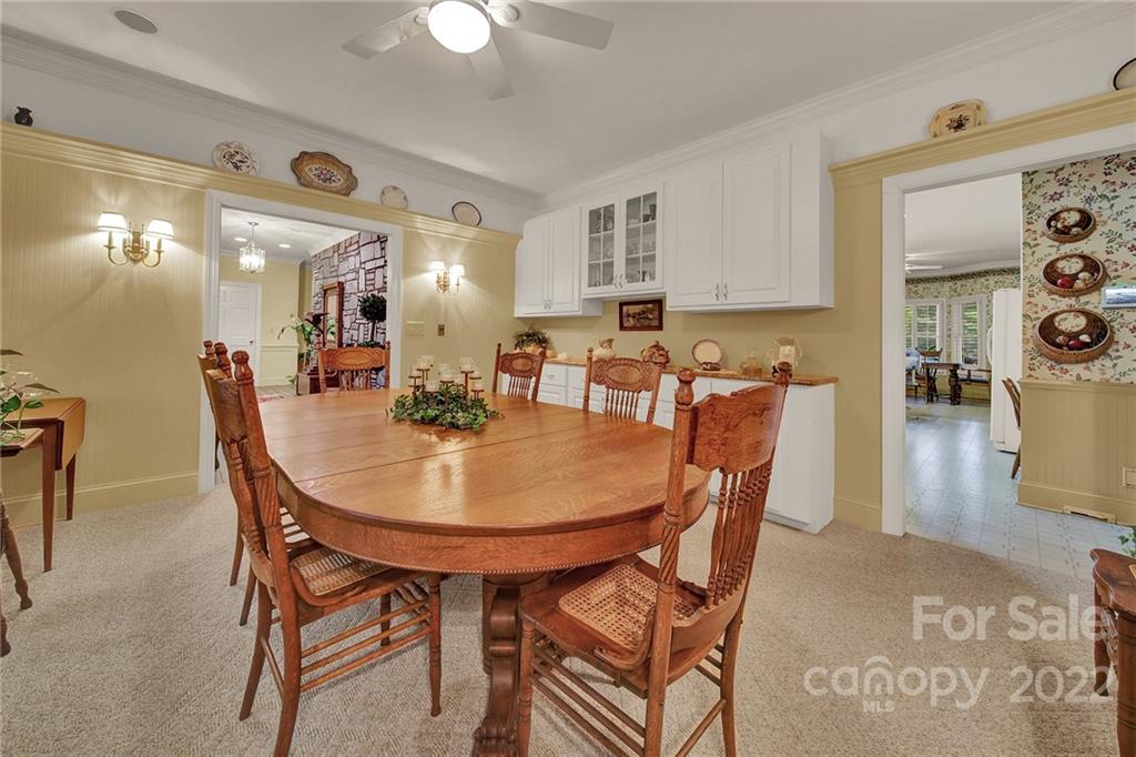 2319 Hough Road Lancaster, SC 29720 - Photo 4 of 48 a dining room with furniture and wooden floor