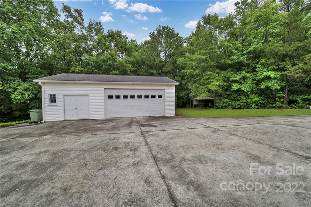 2319 Hough Road Lancaster, SC 29720 - Photo 42 of 48 a view of a house with a yard and garage