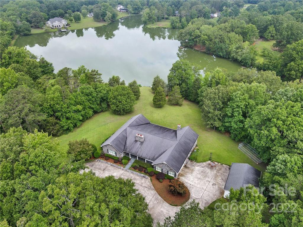 2319 Hough Road Lancaster, SC 29720 - Photo 43 of 48 an aerial view of a house with a yard and lake view