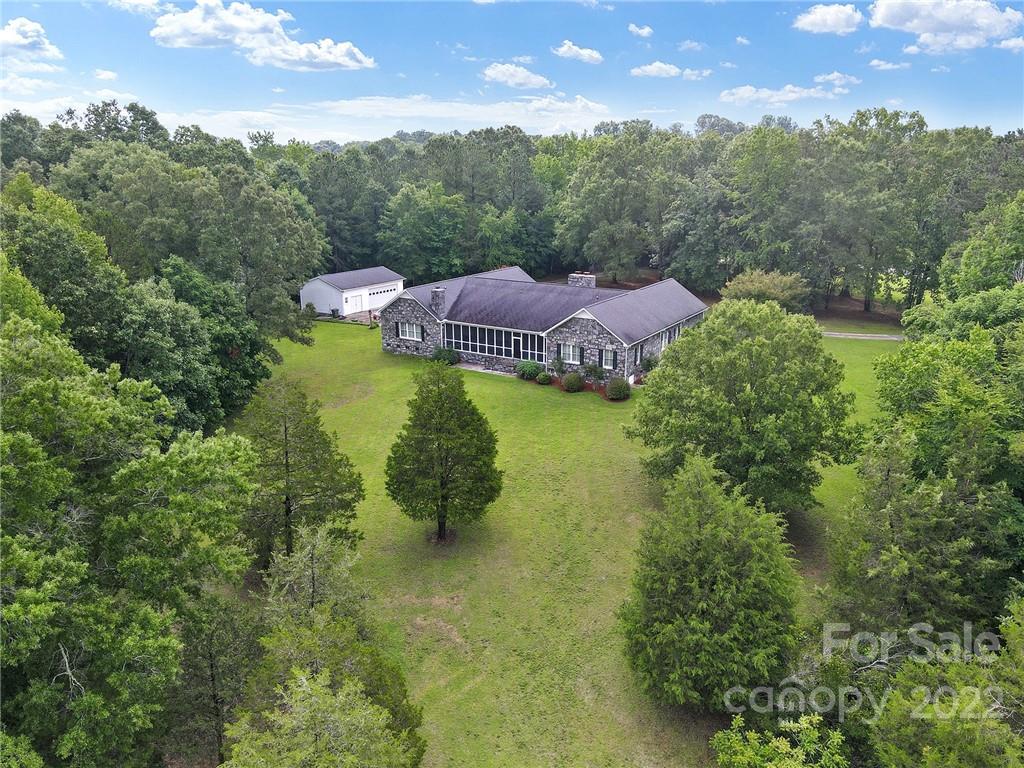 2319 Hough Road Lancaster, SC 29720 - Photo 45 of 48 a view of a lake in middle of the forest