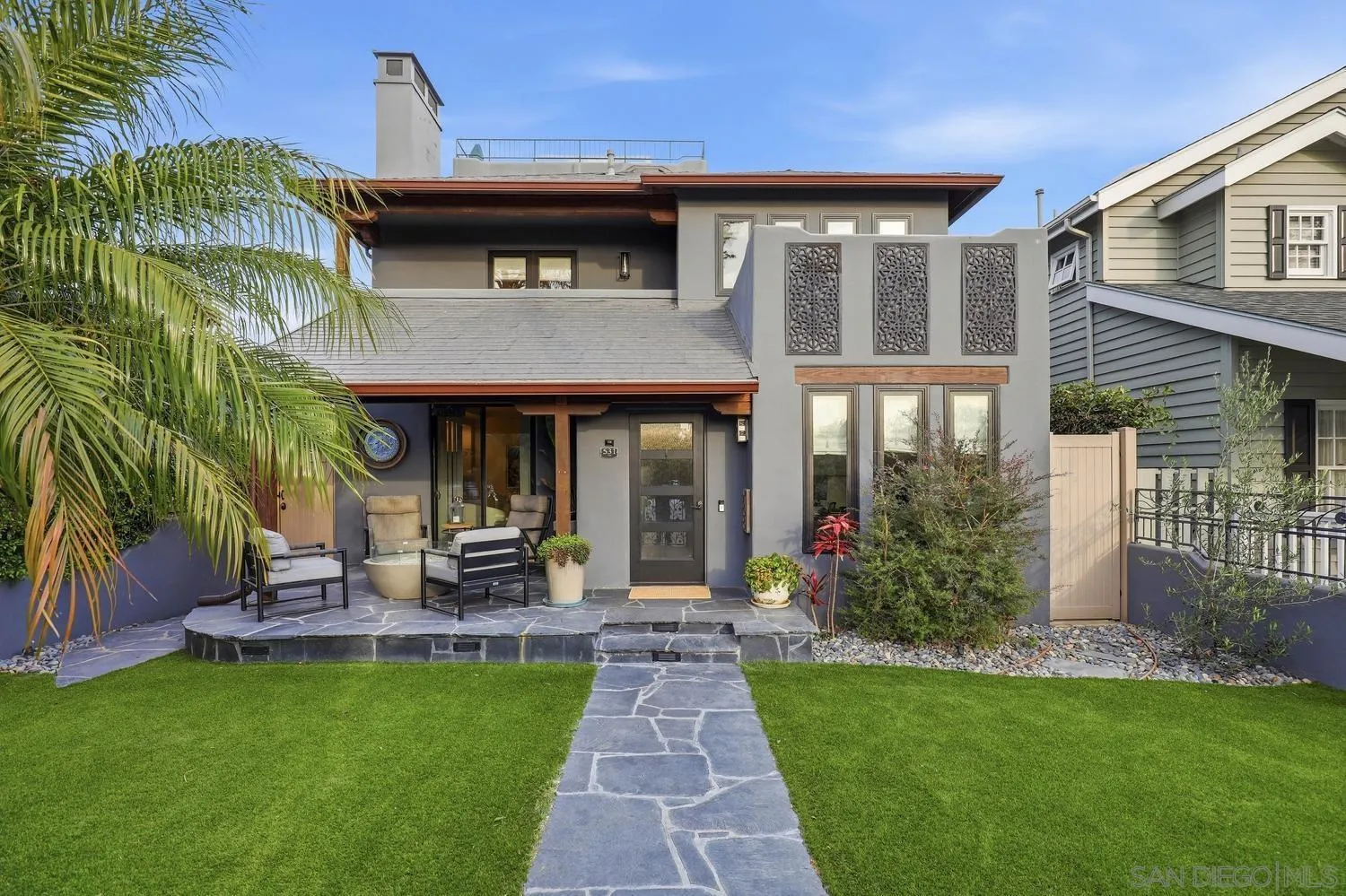531 J Avenue Coronado, CA 92118 - Photo 2 of 58 a front view of house with yard and outdoor seating