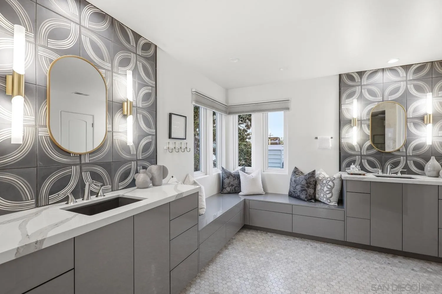 531 J Avenue Coronado, CA 92118 - Photo 27 of 58 a en suite bathroom with a double vanity sink and a mirror