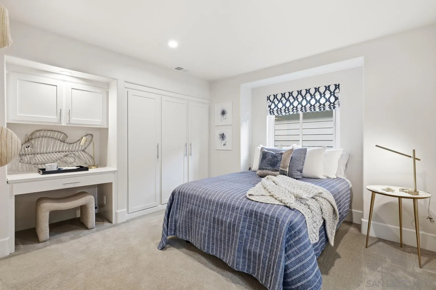 531 J Avenue Coronado, CA 92118 - Photo 29 of 58 a bedroom with a bed and a fireplace