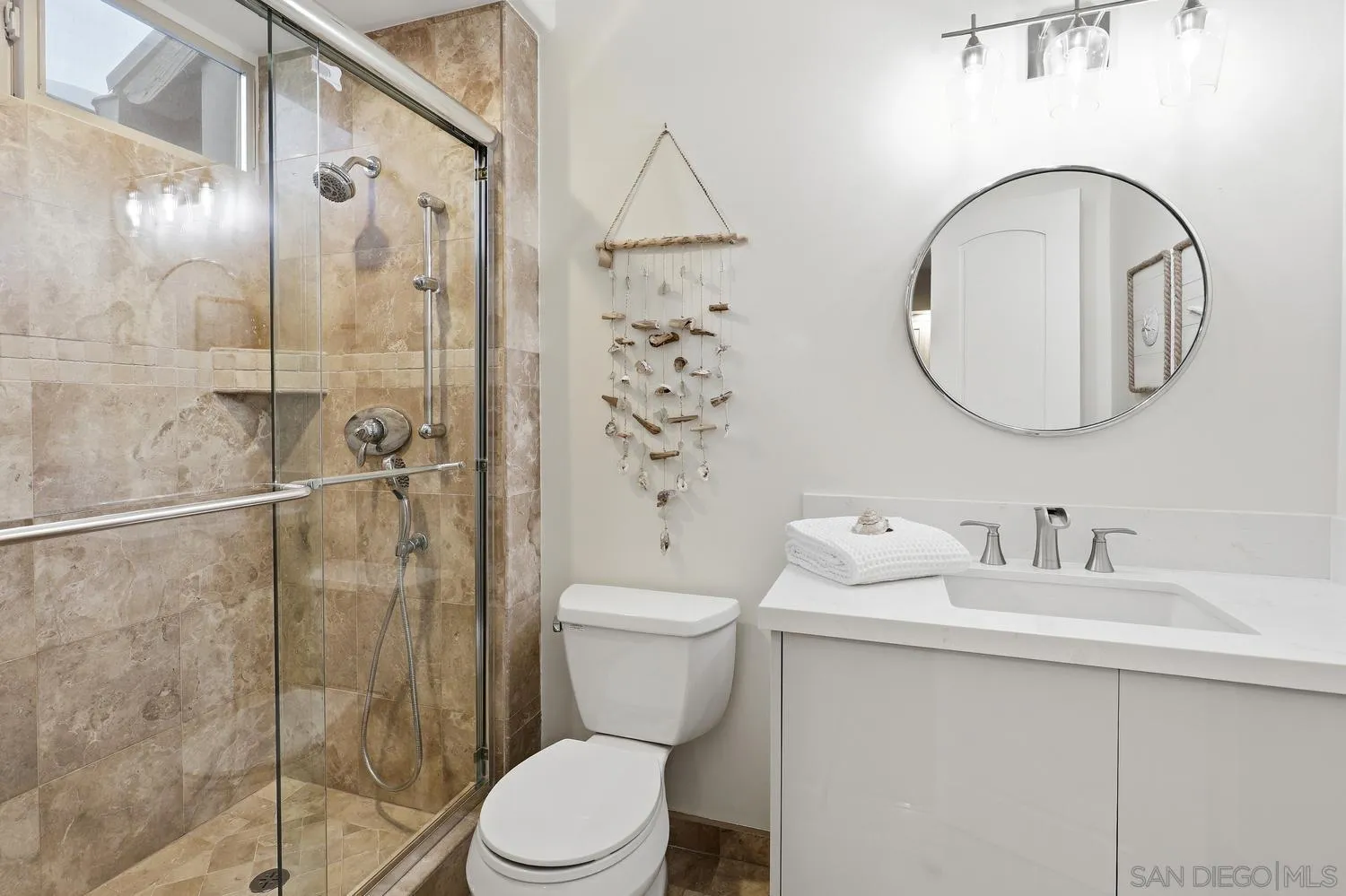 531 J Avenue Coronado, CA 92118 - Photo 31 of 58 a bathroom with a toilet sink and shower