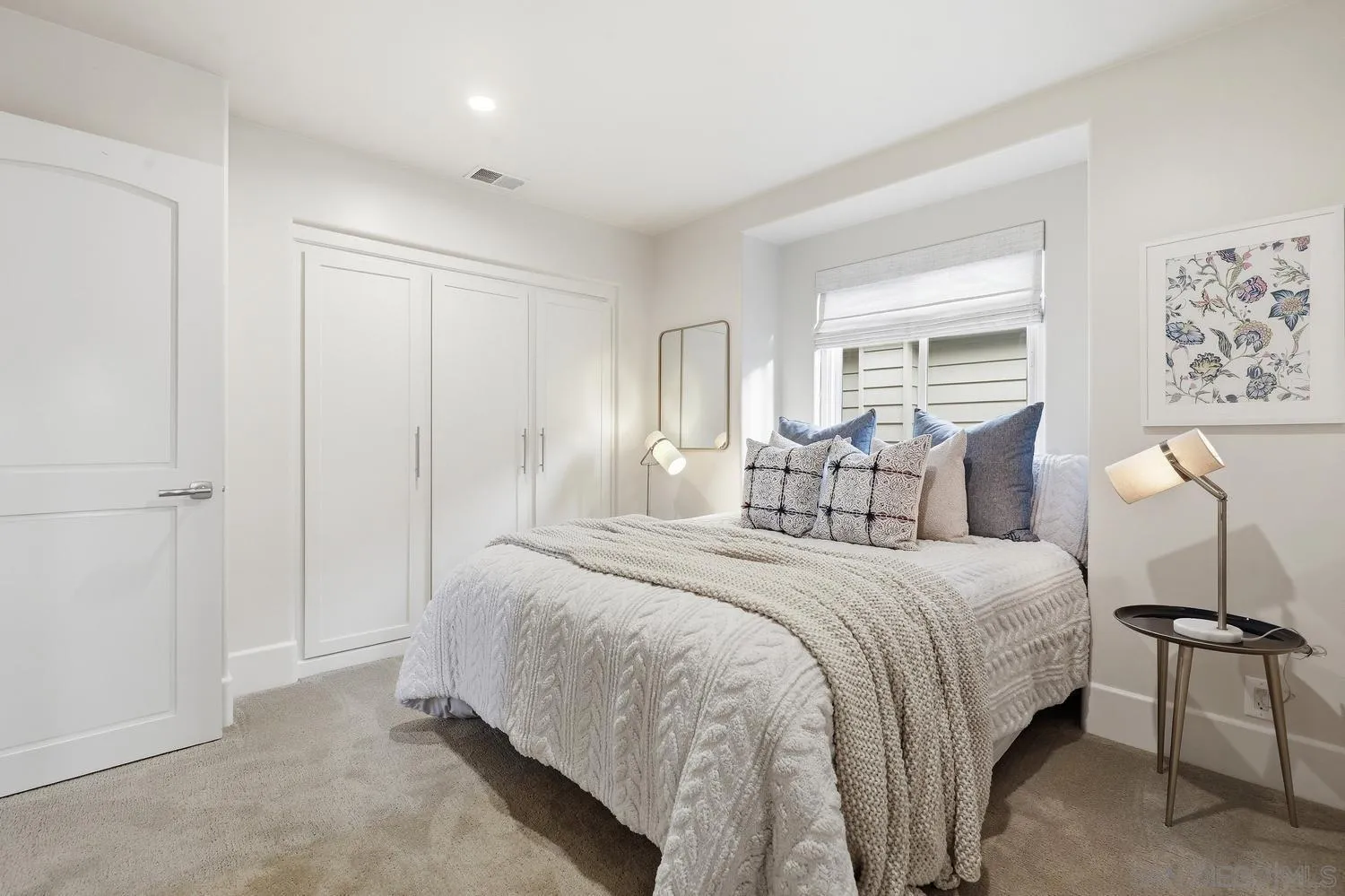 531 J Avenue Coronado, CA 92118 - Photo 33 of 58 a spacious bedroom with a bed and window