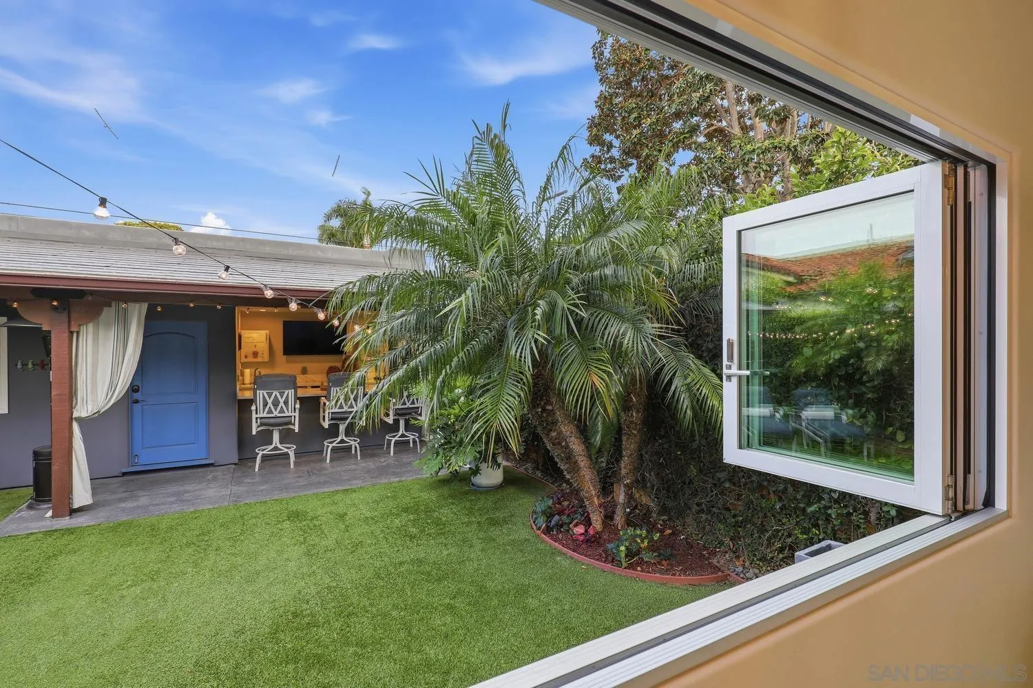 531 J Avenue Coronado, CA 92118 - Photo 39 of 58 a view of a porch with a table and chairs