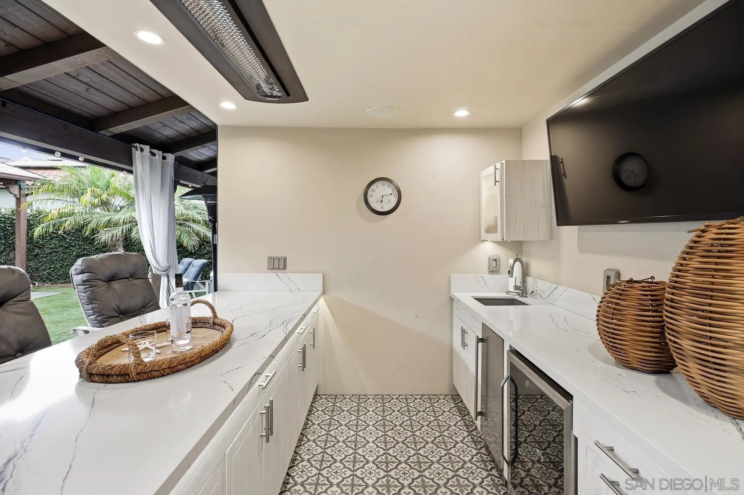 531 J Avenue Coronado, CA 92118 - Photo 44 of 58 a kitchen with stainless steel appliances granite countertop a sink and cabinets