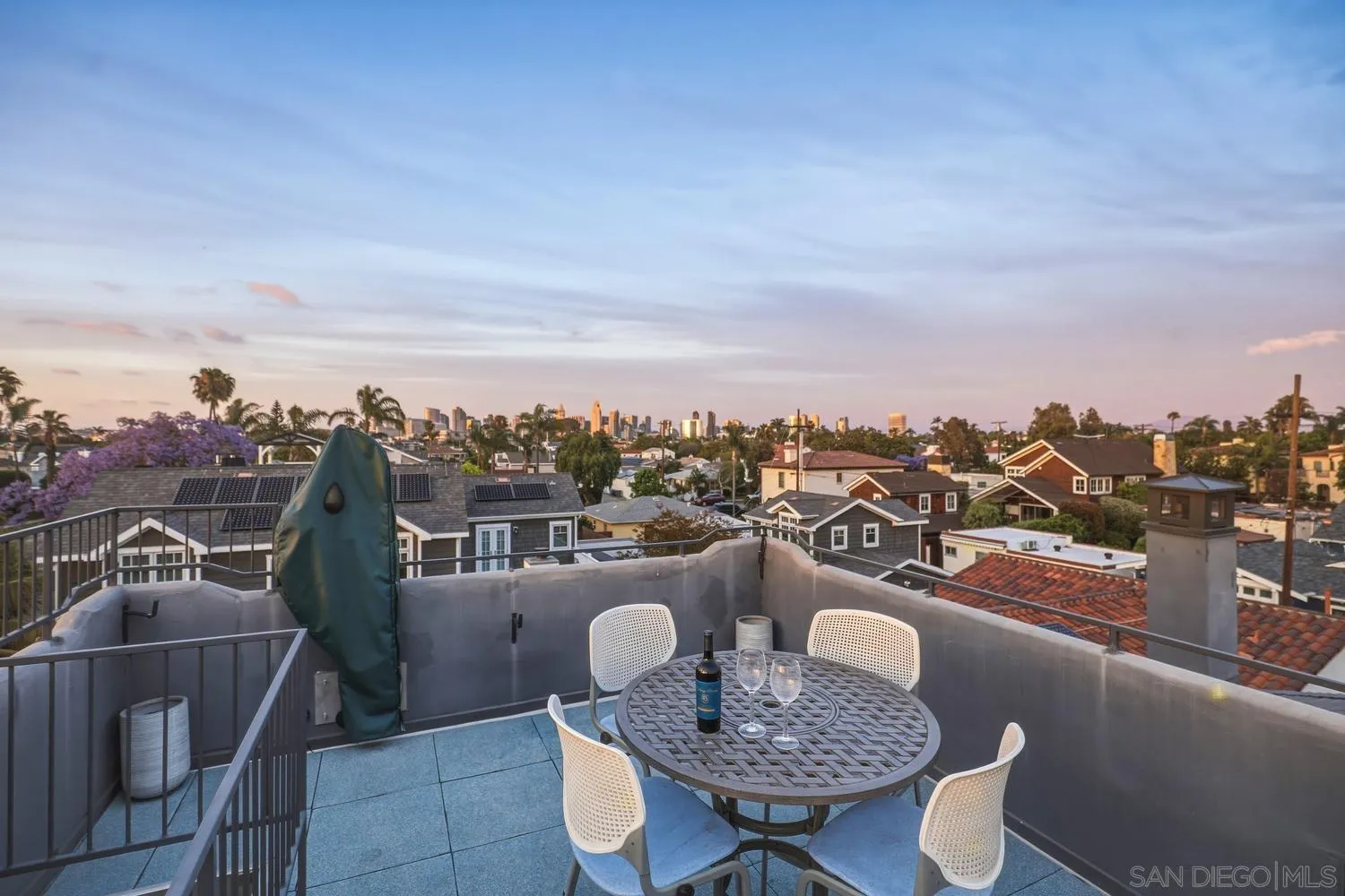 531 J Avenue Coronado, CA 92118 - Photo 45 of 58 a view of a balcony with table and chairs