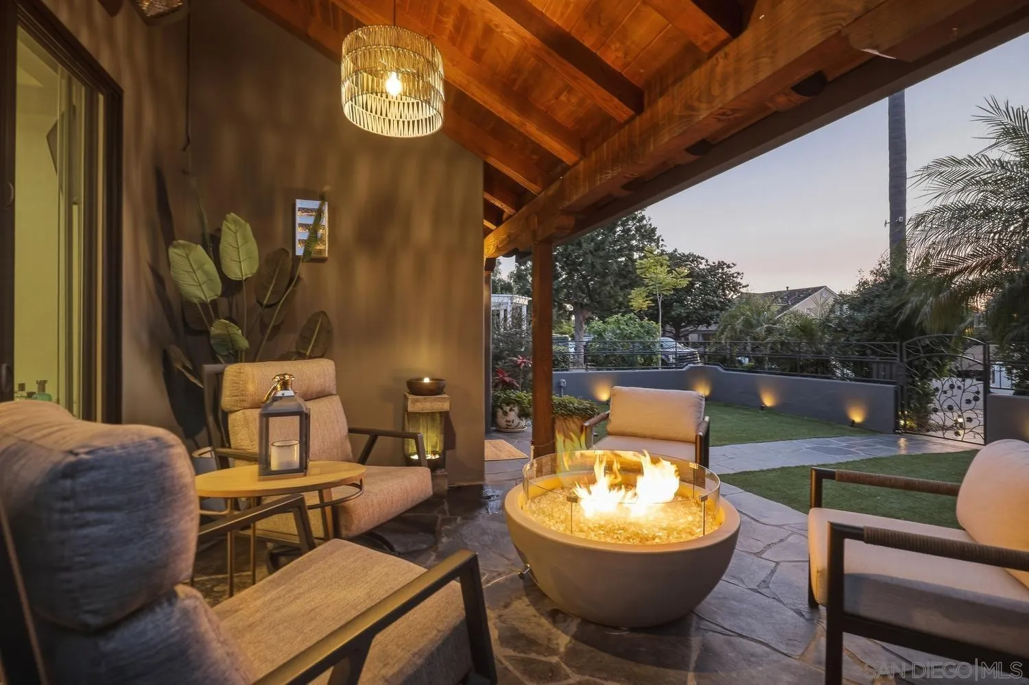 531 J Avenue Coronado, CA 92118 - Photo 51 of 58 a backyard of a house with fountain table and chairs