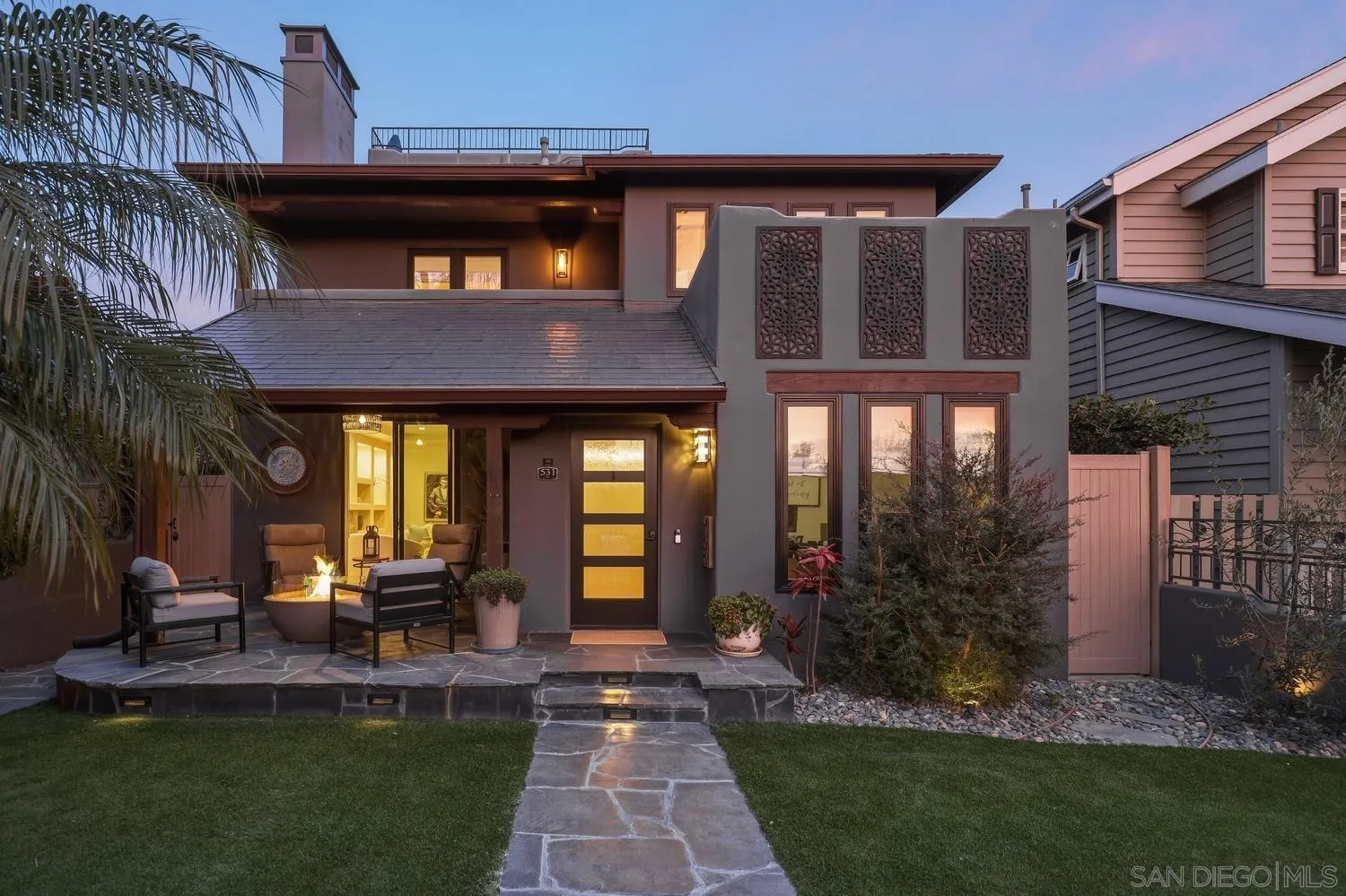531 J Avenue Coronado, CA 92118 - Photo 52 of 58 a front view of a house with a yard