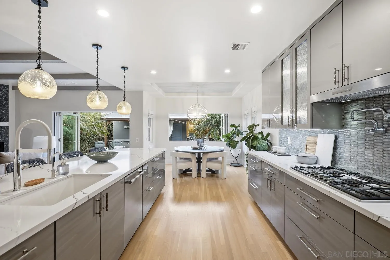 531 J Avenue Coronado, CA 92118 - Photo 9 of 58 a large kitchen with lots of counter space and stainless steel appliances