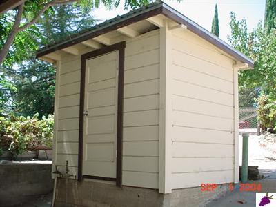 9202 South Kings River Road Reedley, CA 93654 - Photo 6 of 10 Pump house. Domestic pump new in 2002.