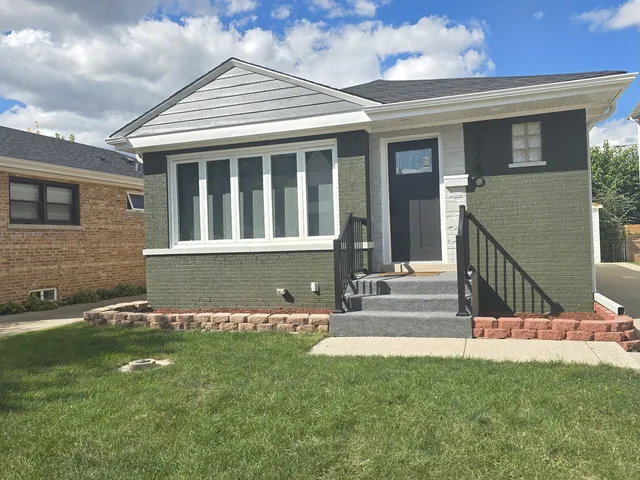 front view of house with a yard