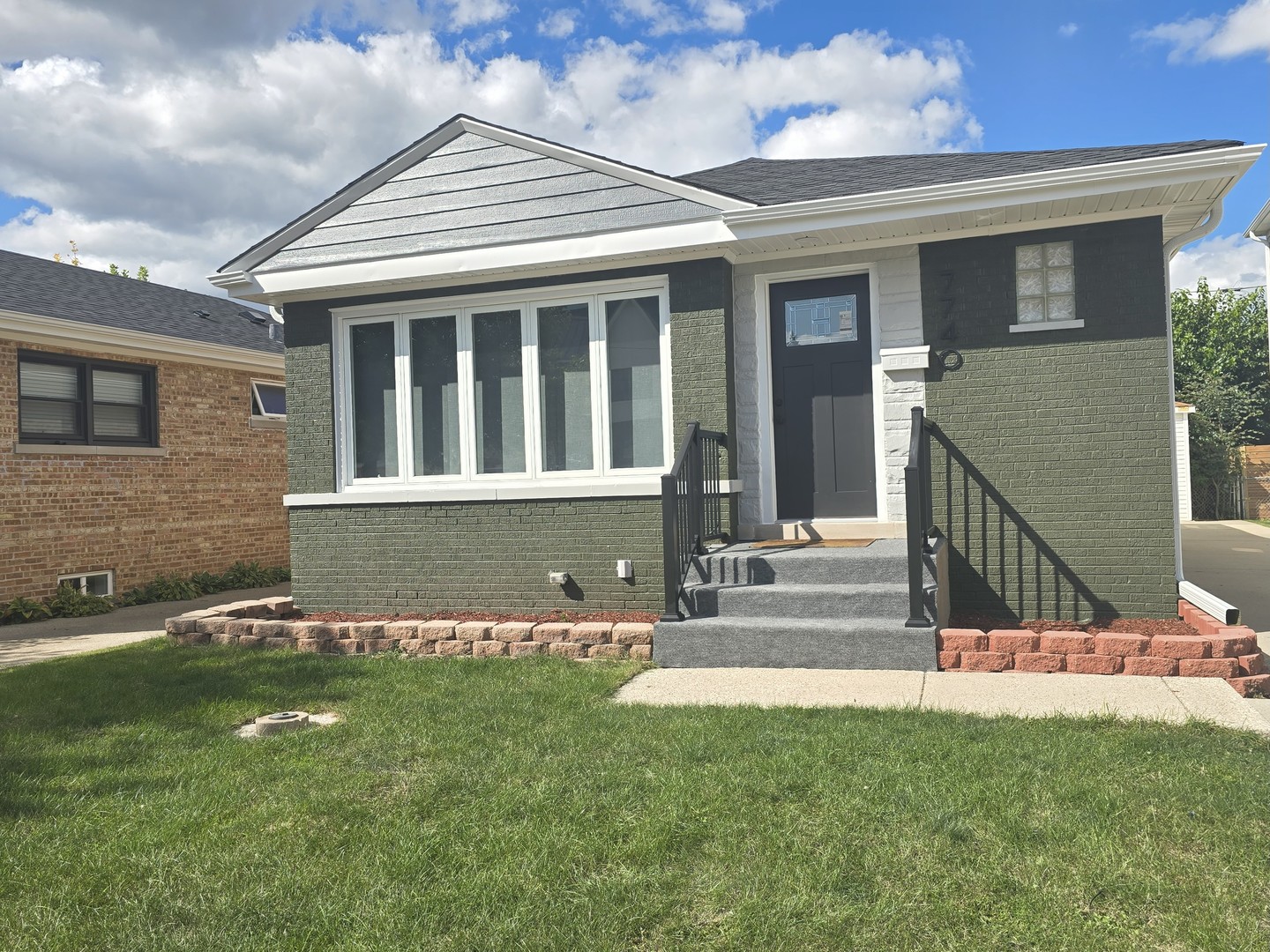 front view of house with a yard