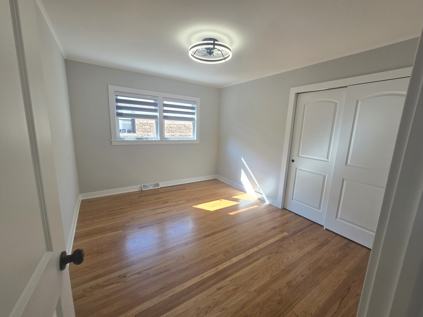 7740 West Norwood Street Chicago, IL 60631 - Photo 17 of 24 a view of empty room with wooden floor