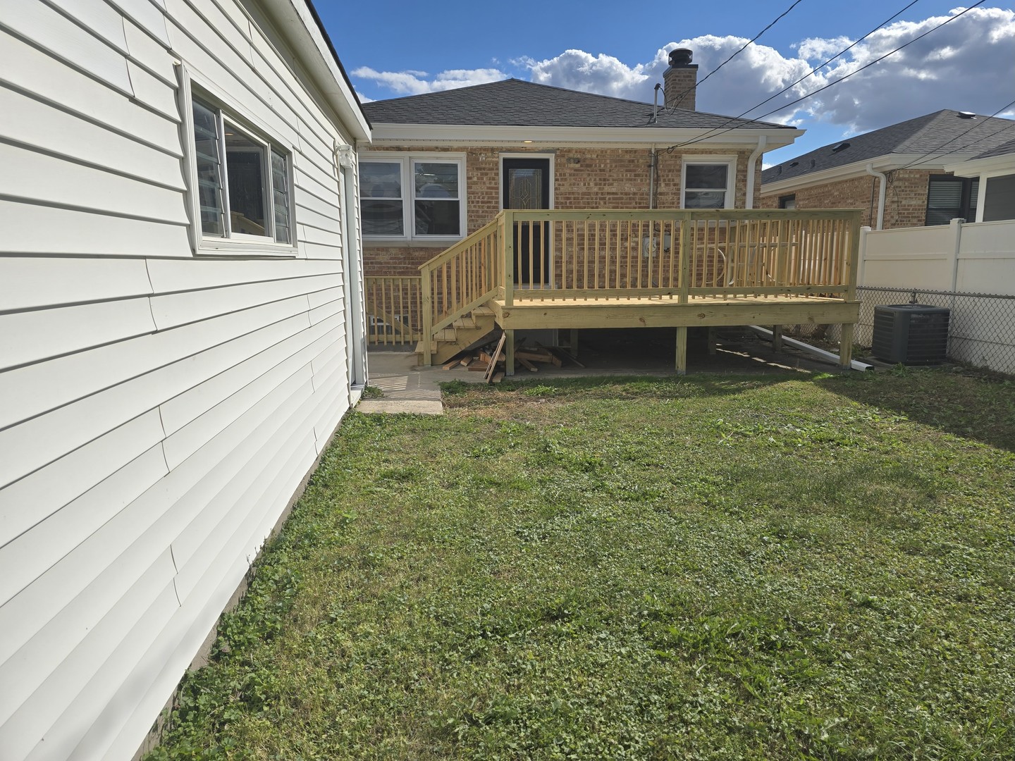 7740 West Norwood Street Chicago, IL 60631 - Photo 22 of 24 a view of a house with a yard and sitting area
