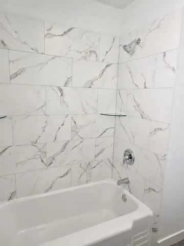 a bathroom with a bathtub