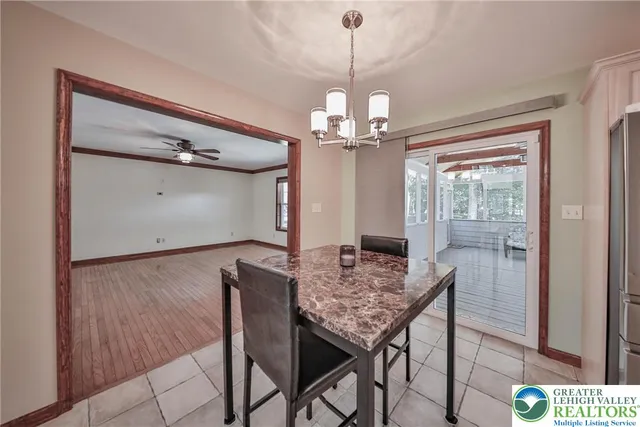 a kitchen with granite countertop a stove sink and cabinets