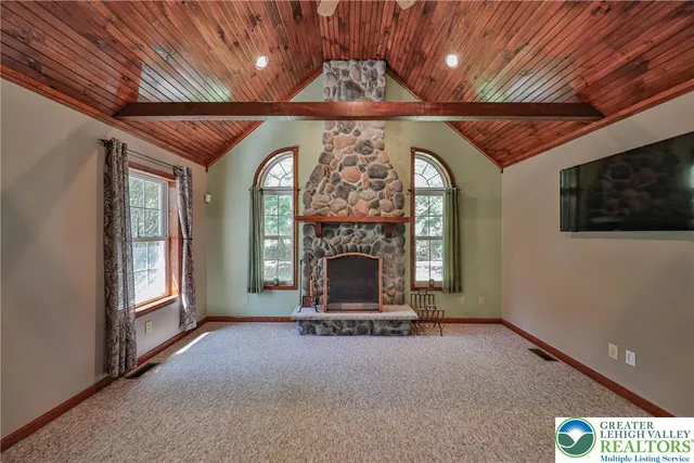 a view of entryway with stairs and wooden floor