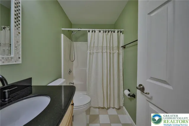 a view of a park with large trees