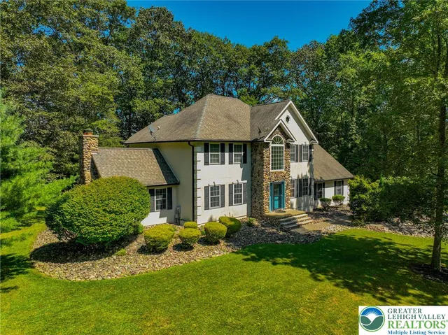 a view of a lake with a houses