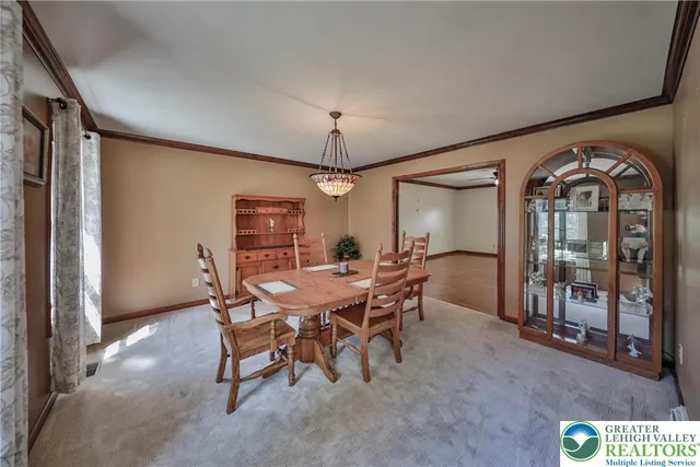 a kitchen with stainless steel appliances granite countertop a refrigerator a oven and a sink