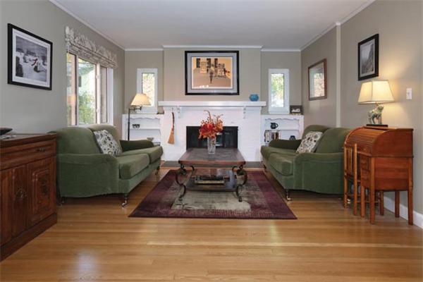 59 Leland Road Brookline, MA 02467 - Photo 2 of 10 a living room with furniture and a fireplace
