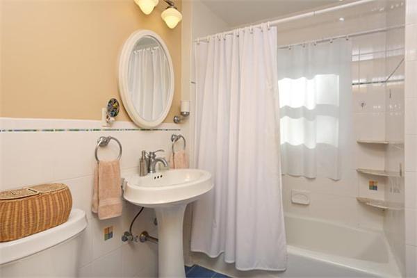 59 Leland Road Brookline, MA 02467 - Photo 9 of 10 a bathroom with a sink a toilet and shower
