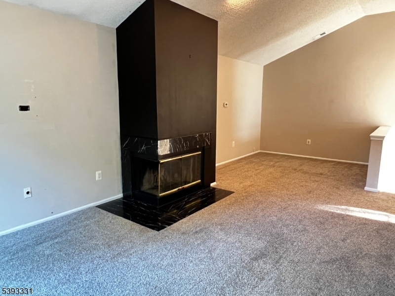 1007 Magnolia Lane Somerville, NJ 08876 - Photo 4 of 13 a living room with hard wood floor and a ceiling fan