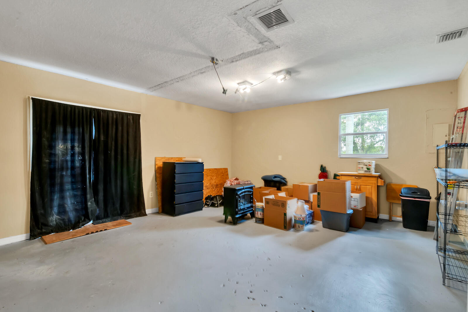 4091 Mandarin Boulevard Loxahatchee, FL 33470 - Photo 14 of 31 a view of a room with gym equipment