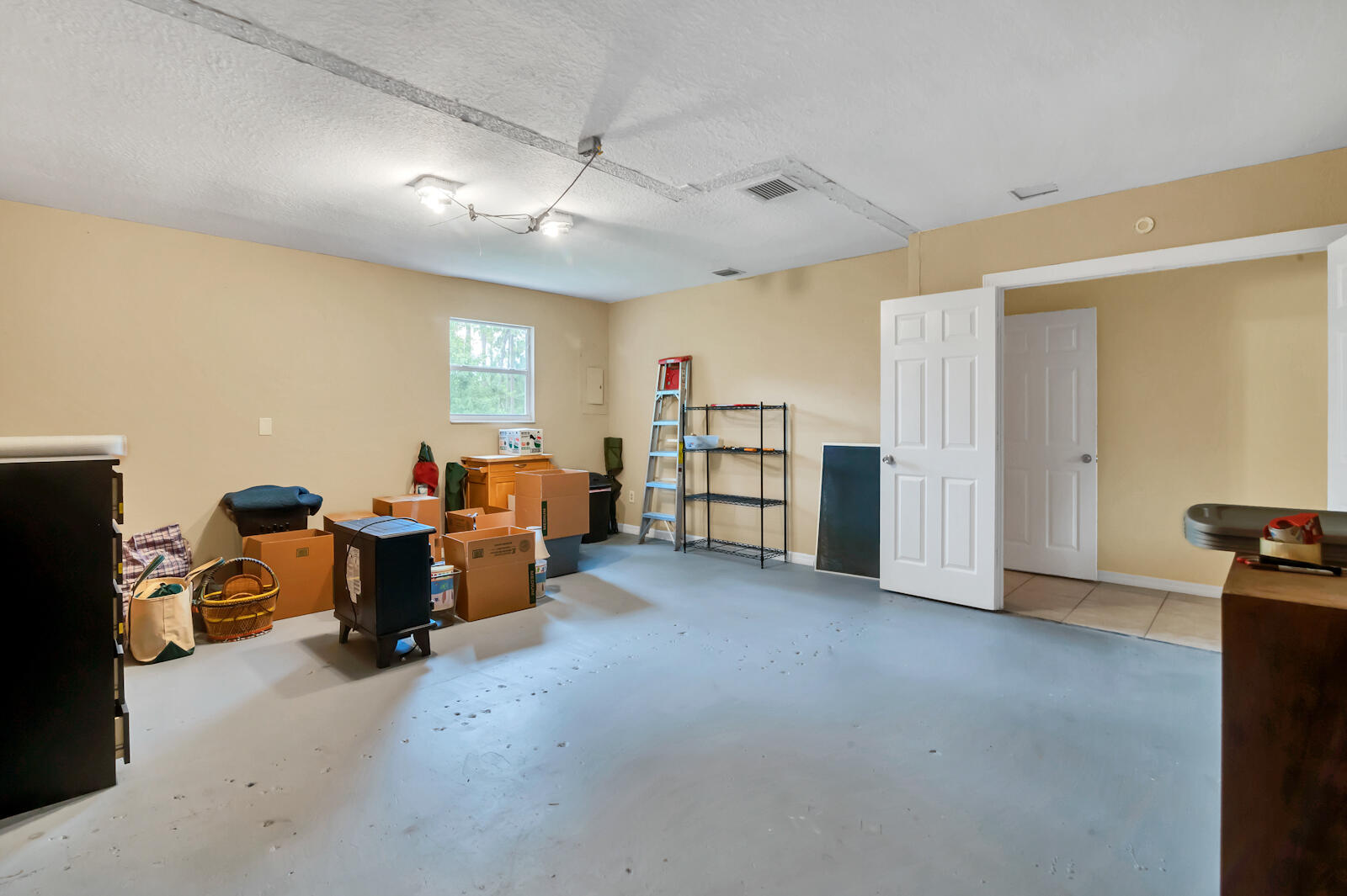4091 Mandarin Boulevard Loxahatchee, FL 33470 - Photo 15 of 31 a view of a livingroom with furniture and a ceiling fan