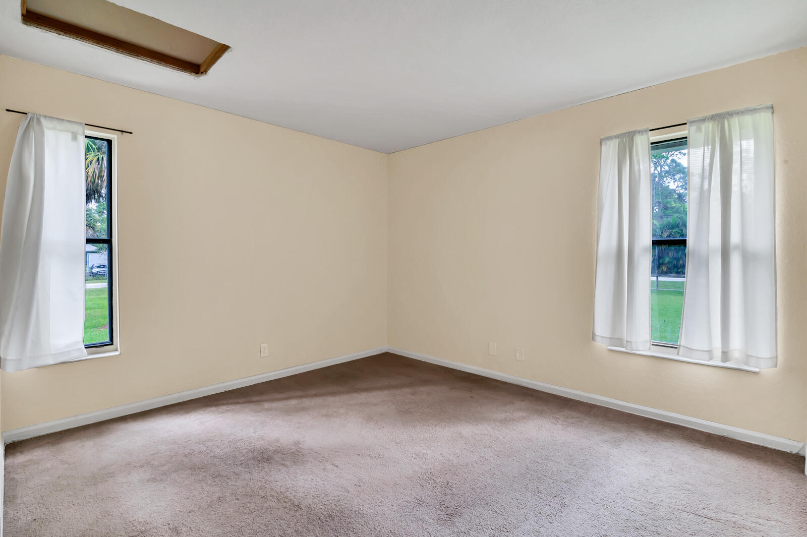 4091 Mandarin Boulevard Loxahatchee, FL 33470 - Photo 18 of 31 an empty room with windows
